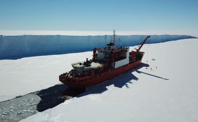 Ice breaking ship clears a path