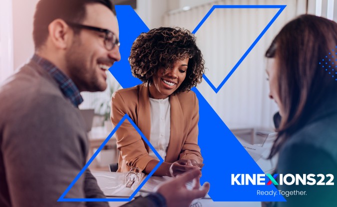 Three business people collaborating at a table